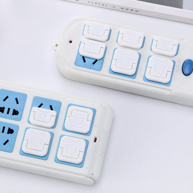 Safety plug for power switch sockets, including 4 two-hole and 4 three-hole plugs.