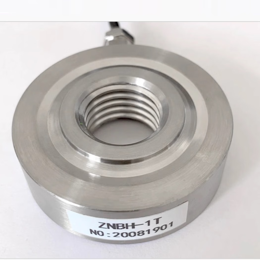 USAMR high-precision through-shaft hollow ring load cell with through-hole clamping force and force measuring bolt preload.