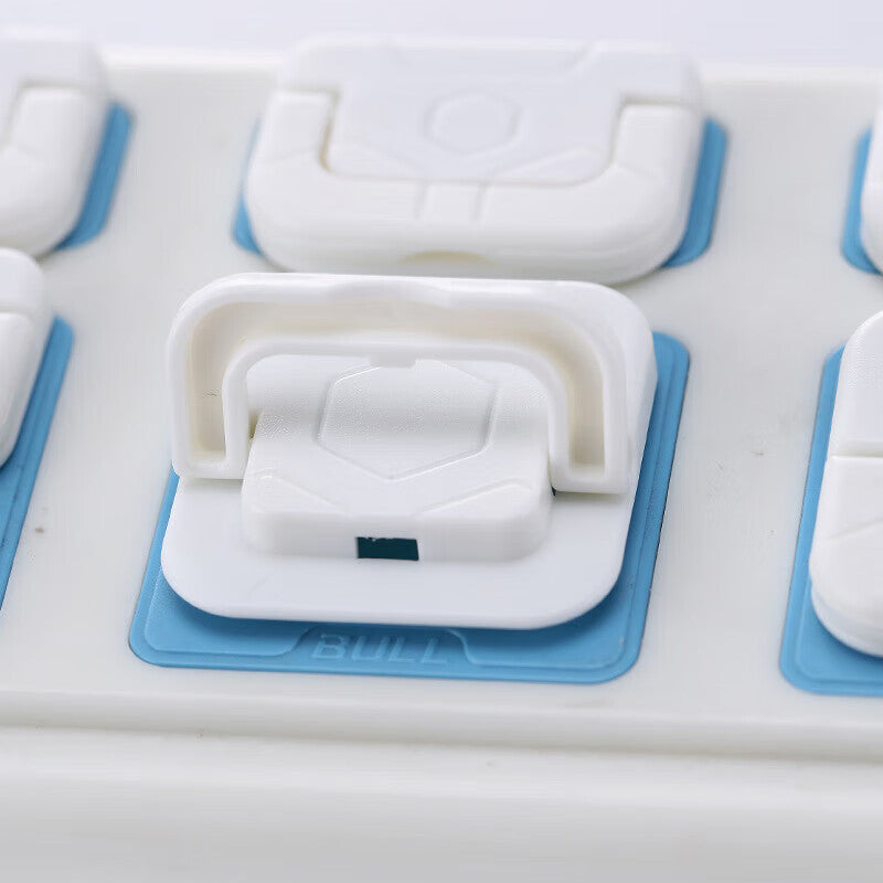 Safety plug for power switch sockets, including 4 two-hole and 4 three-hole plugs.