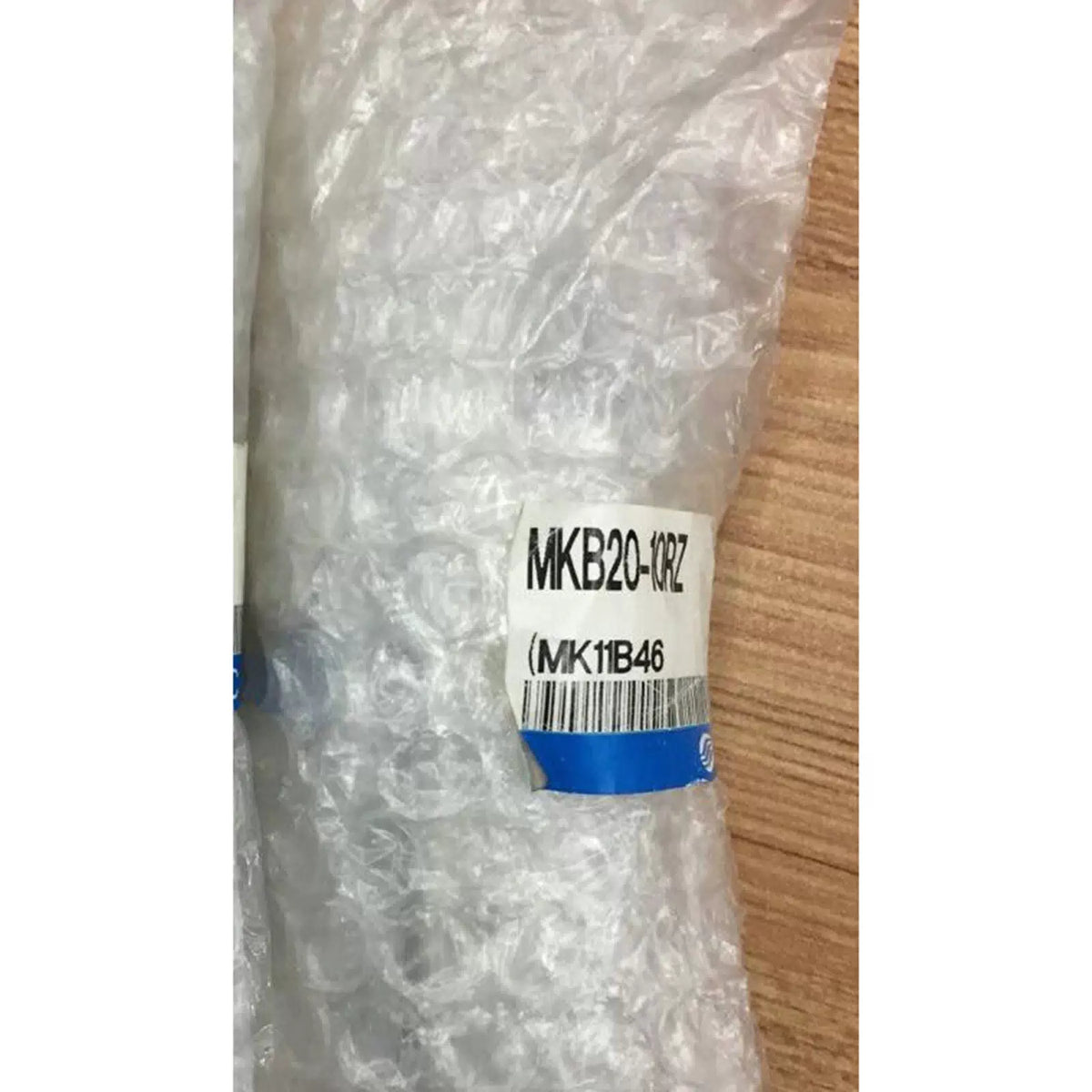 one SMC MKB20-10RZ Rotary clamping cylinder [2]