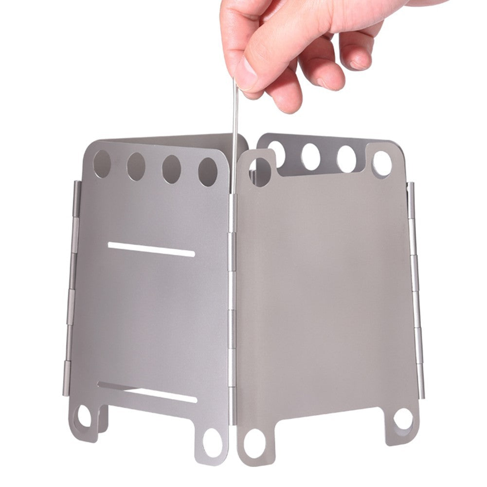 Innovative Folding Wood Stove For Sustainable And Safe Outdoor Cooking