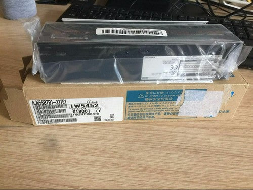 Mitsubishi In Box PLC output module AJ65SBTB1-32TE1 One year warranty